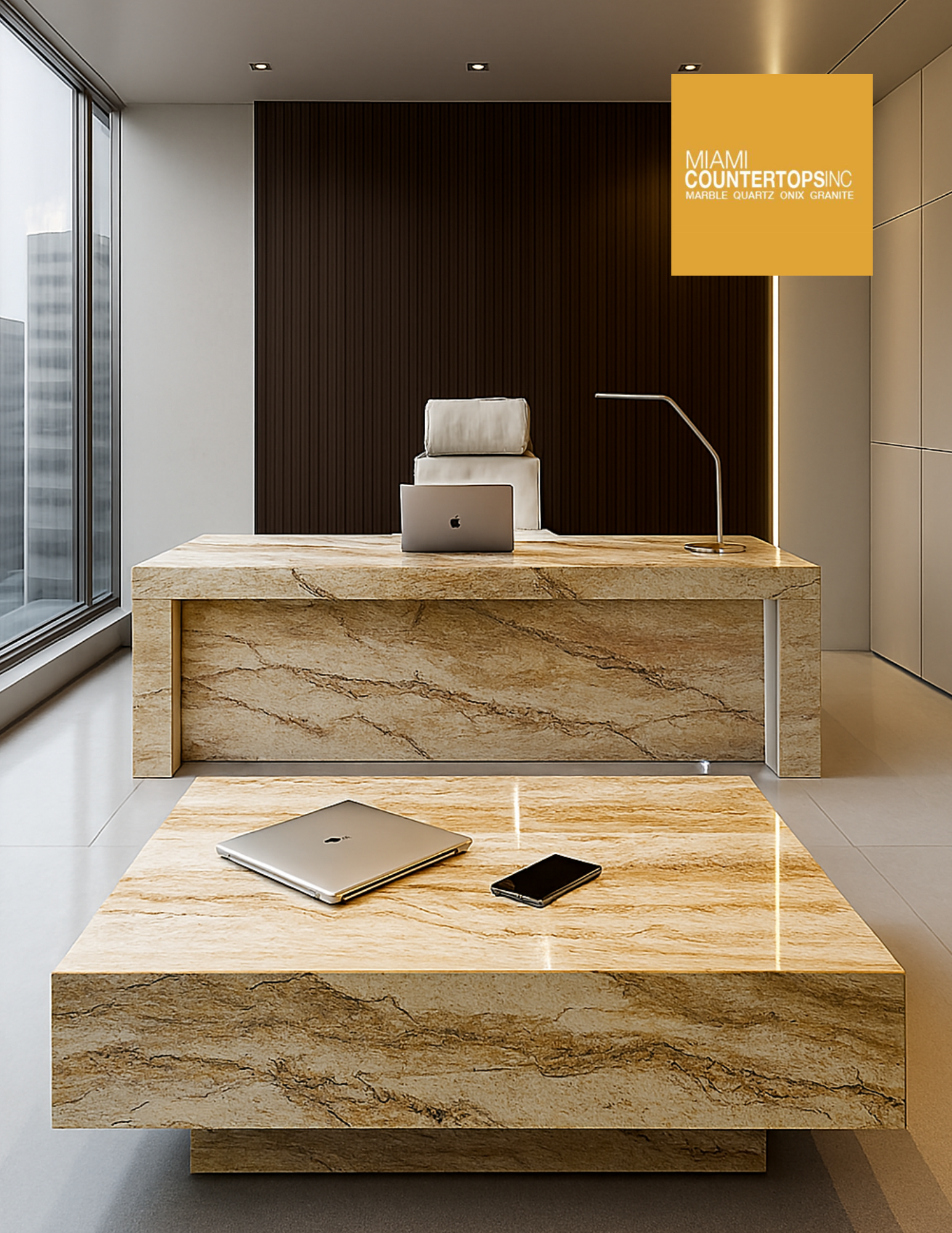 Modern Miami office interior featuring custom marble desk and coffee table with natural veining and panoramic city views.