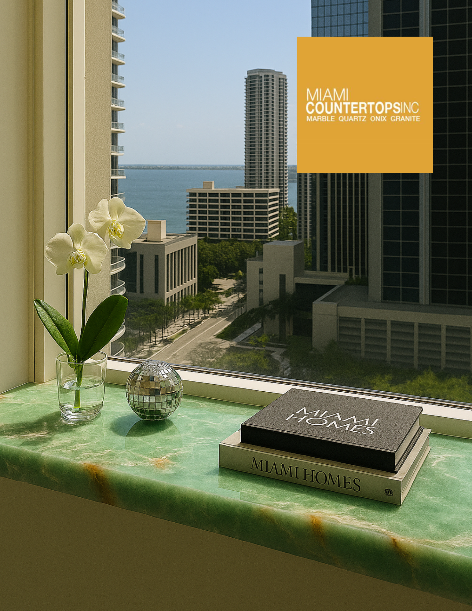 Green marble windowsill in a Miami high-rise residence with tropical skyline views and luxury decor accents.