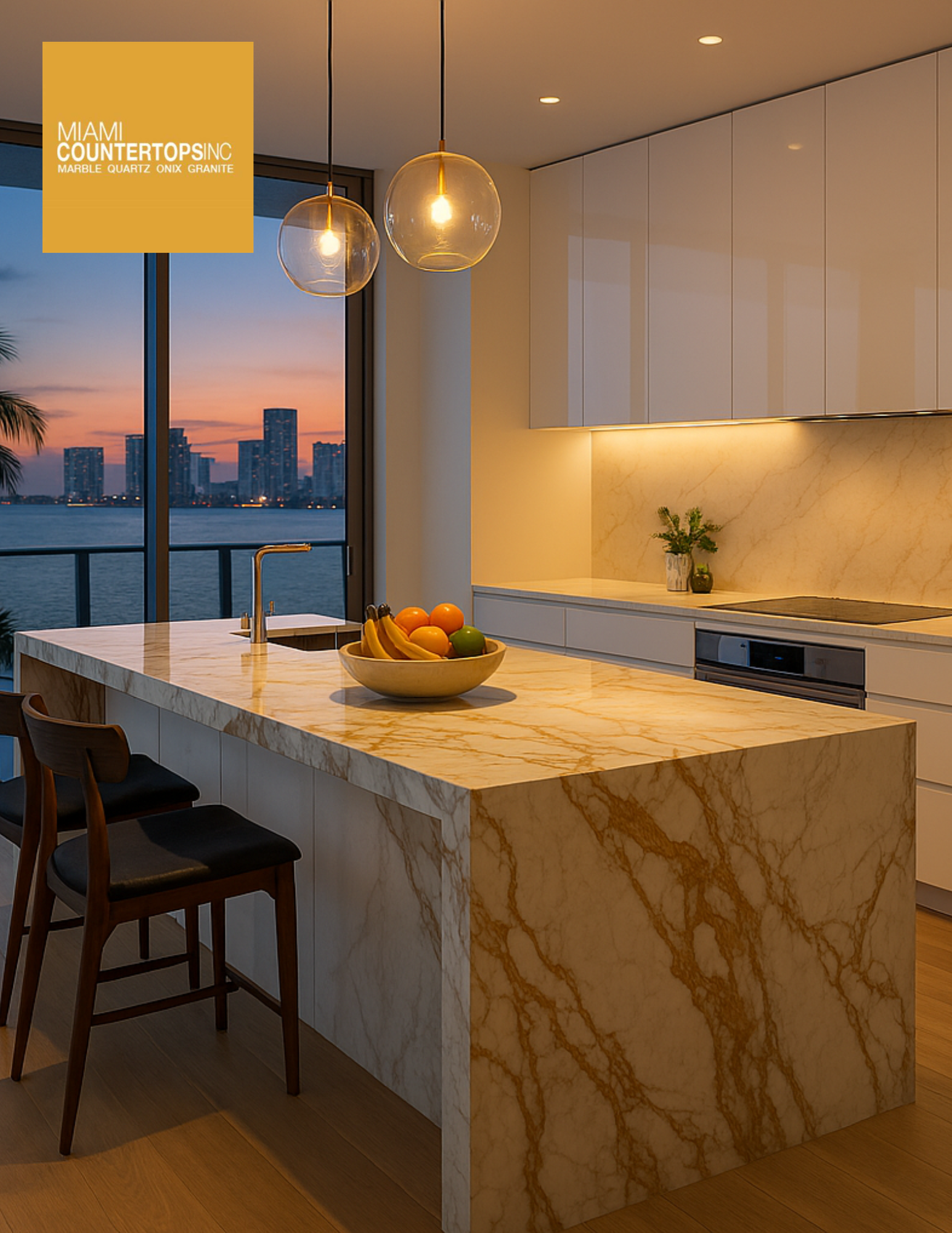 Luxury Brickell high‑rise kitchen featuring a bold veining Calacatta quartz Miami waterfall island fabricated by Miami Stone Fabricators, surrounded by sleek white cabinetry and floor‑to‑ceiling windows — ideal for Miami quartz countertops, luxury condo countertops Brickell, and low maintenance countertops Miami.