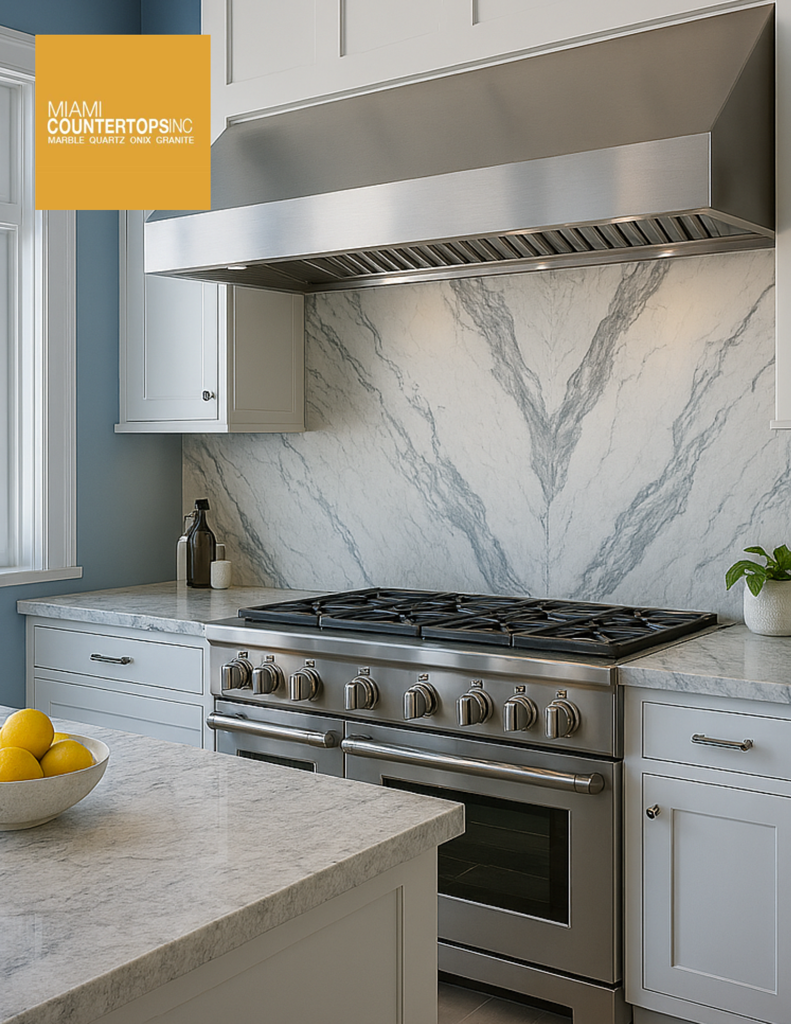 Modern South Florida kitchen featuring a full‑height stone backsplash Florida fabricated in bookmatched marble look quartz by Miami Stone Fabricators, paired with Miami quartz countertops and premium stainless appliances — ideal for South Florida kitchen countertops and best countertops for Florida humidity.